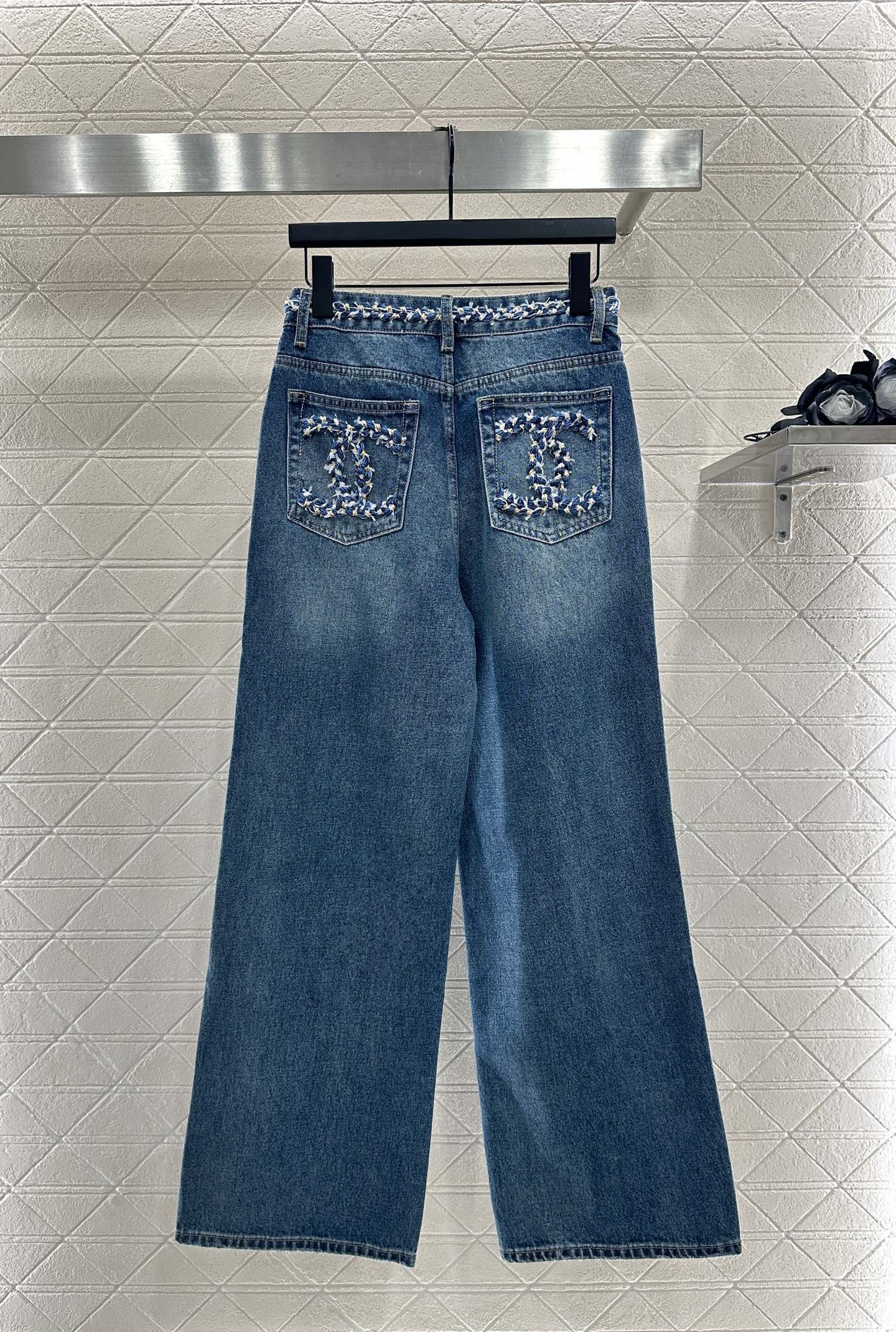 C 25 High-waisted bleached pleated denim trousers