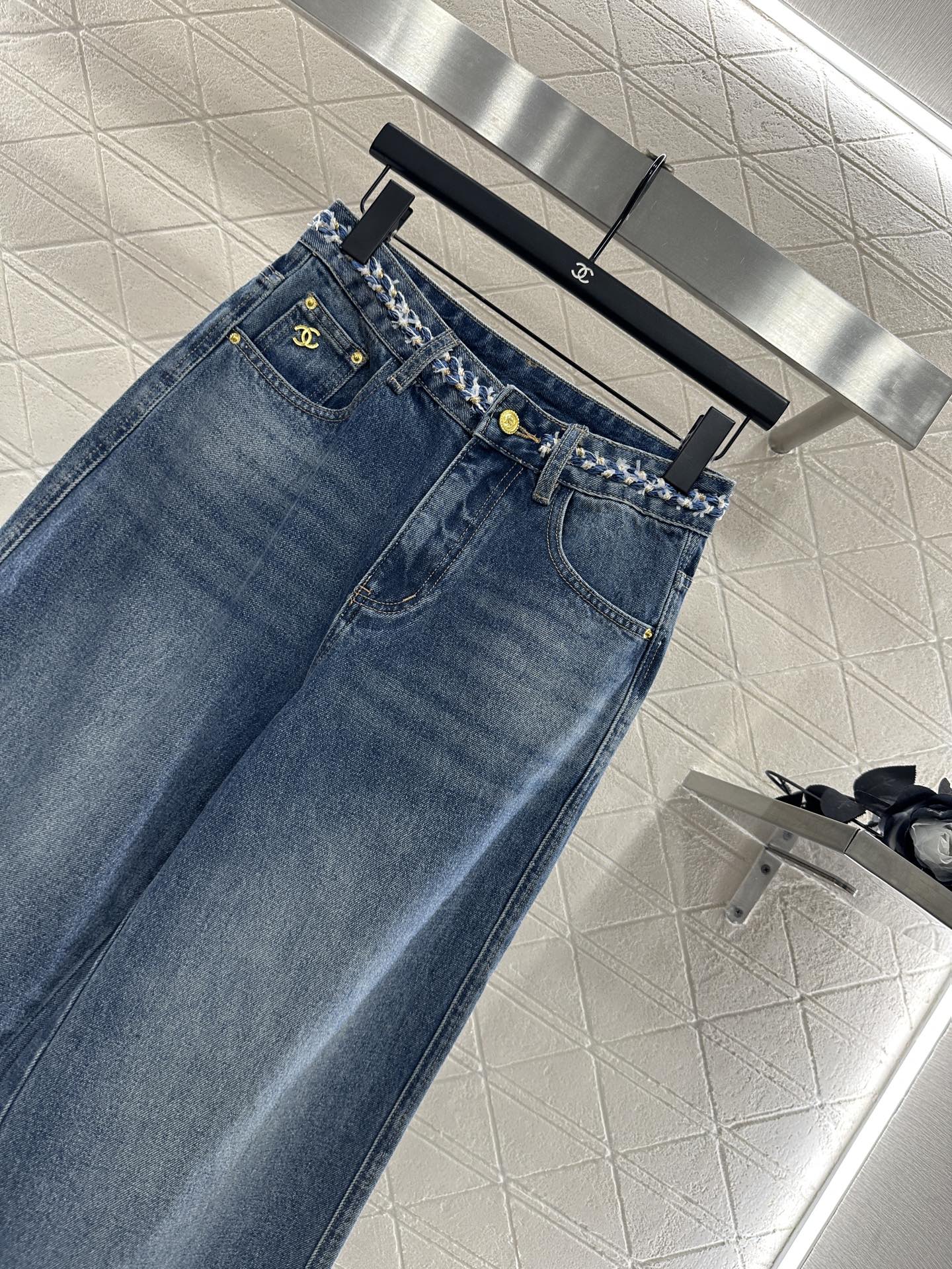 C 25 High-waisted bleached pleated denim trousers
