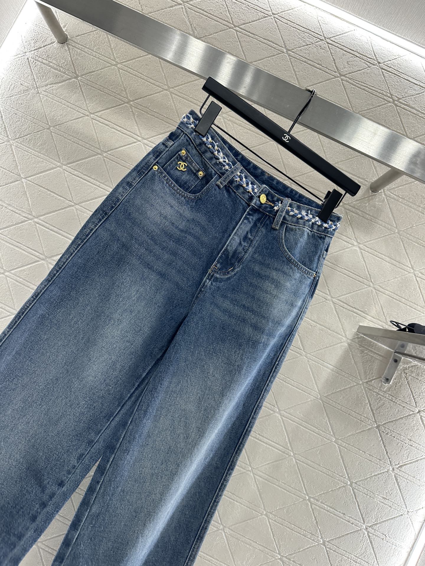 C 25 High-waisted bleached pleated denim trousers