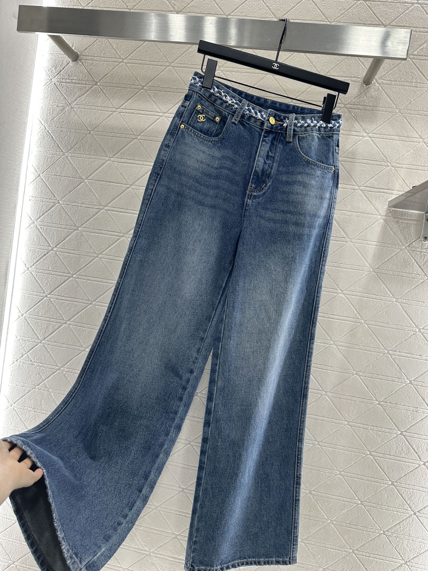 C 25 High-waisted bleached pleated denim trousers
