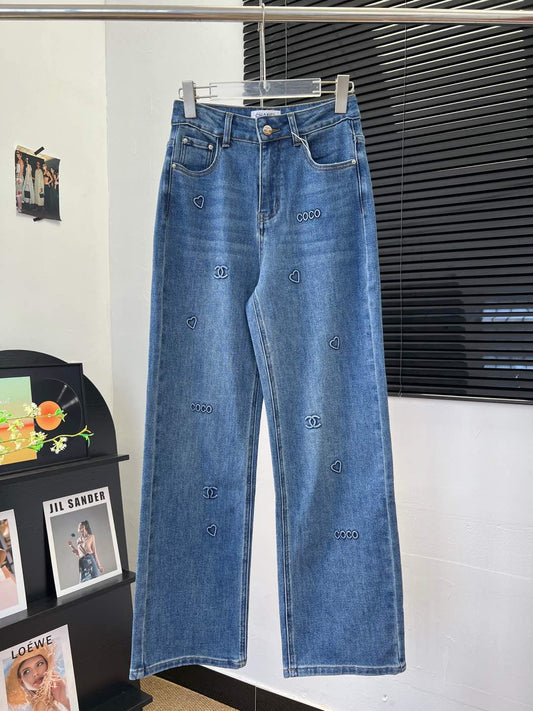 C 25 Laminated lettering stretch straight-leg trousers