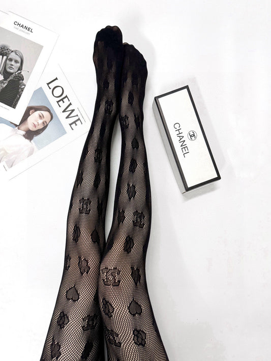 C Heart logo fishnet tights