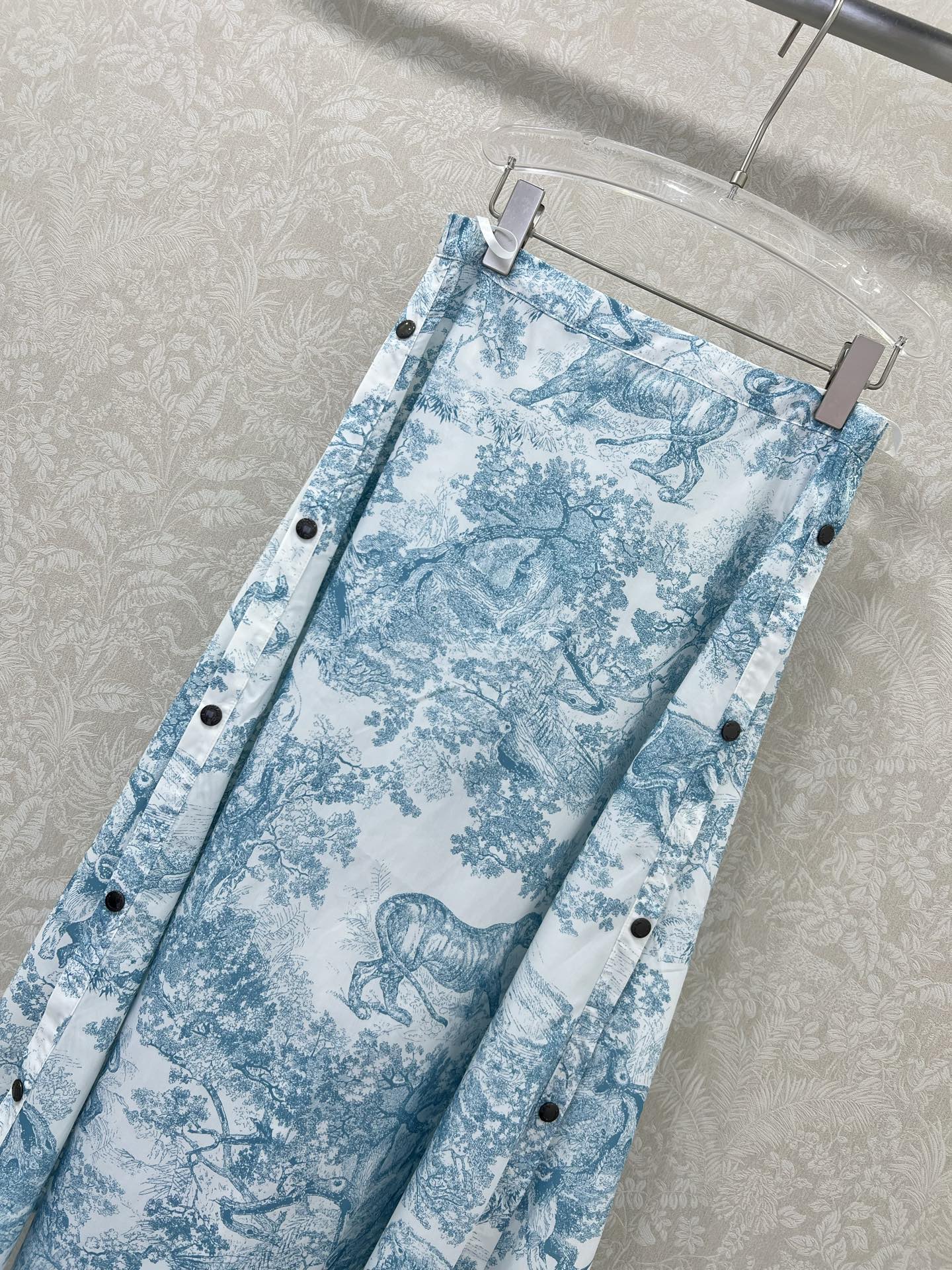 D 25 New Jungle animal print, two side buttons half skirt.