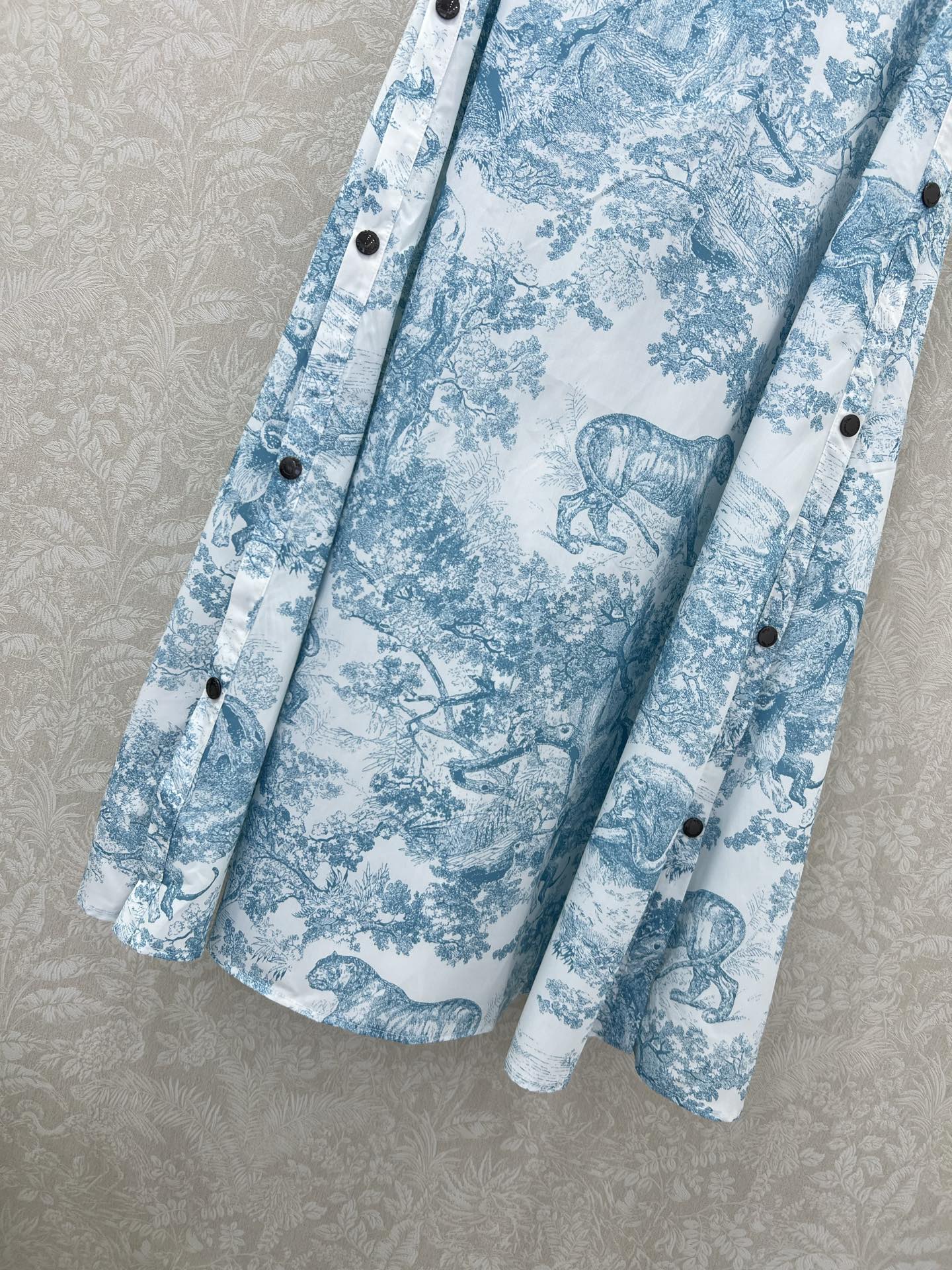 D 25 New Jungle animal print, two side buttons half skirt.