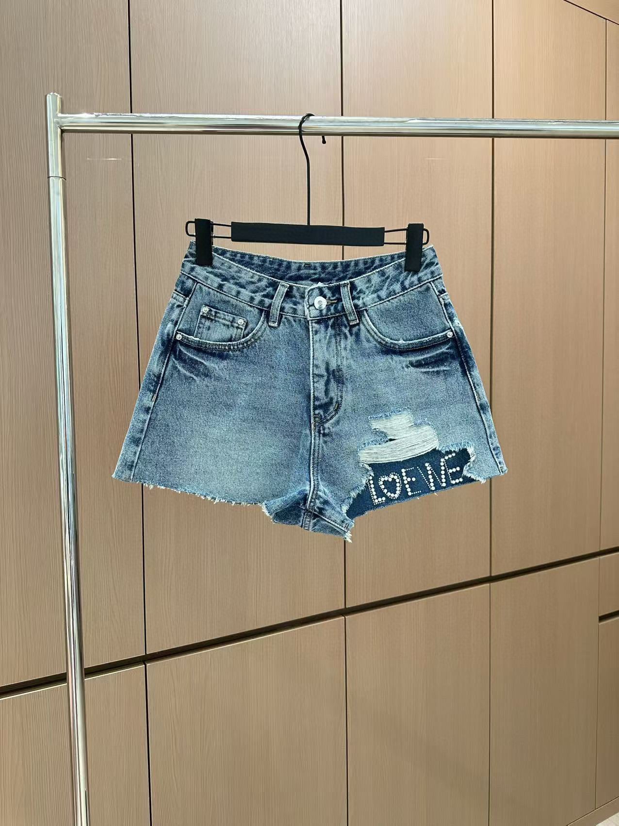 LO 25 Rhinestone Logo Ripped Denim Shorts