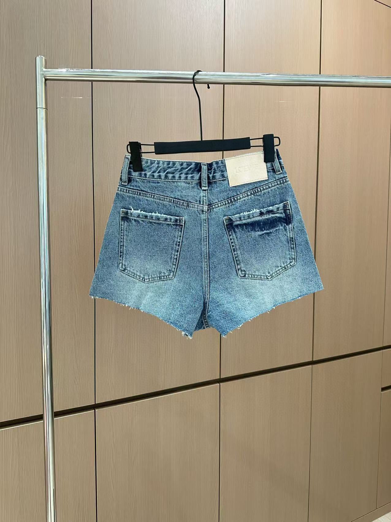 LO 25 Rhinestone Logo Ripped Denim Shorts