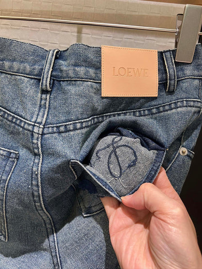 LO 25 Raw-edge fringe denim shorts