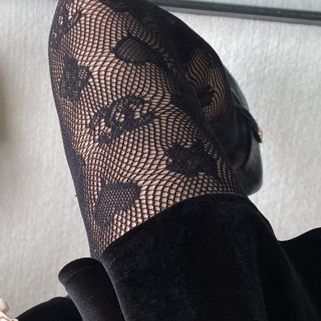 C Heart logo fishnet tights