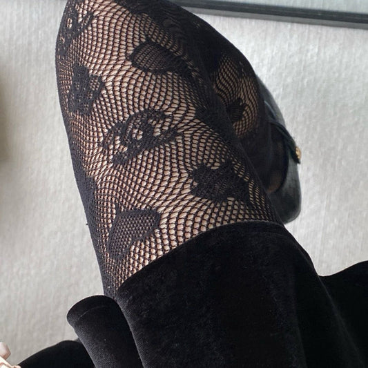C Heart logo fishnet tights