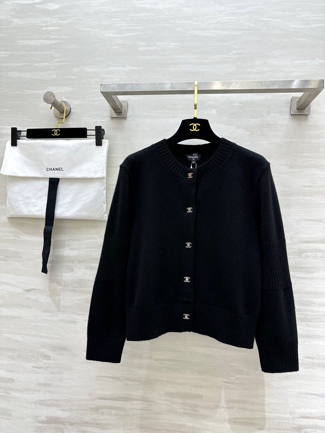 C 25 Backpack buckle cashmere cardigan + skirt