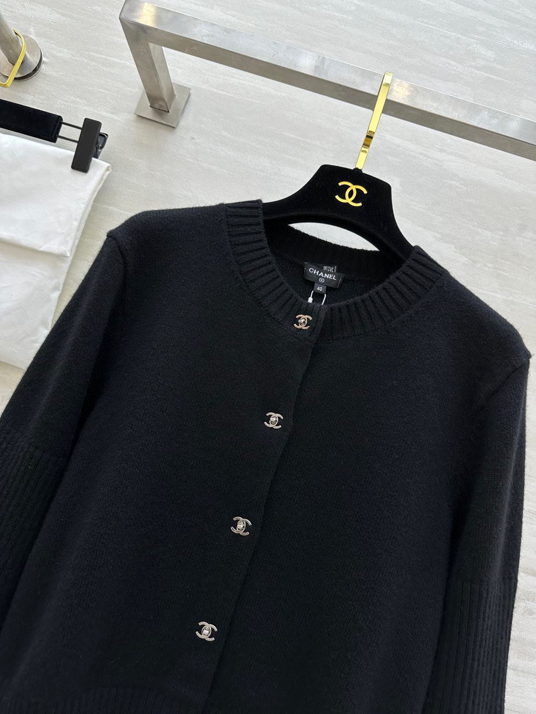C 25 Backpack buckle cashmere cardigan + skirt