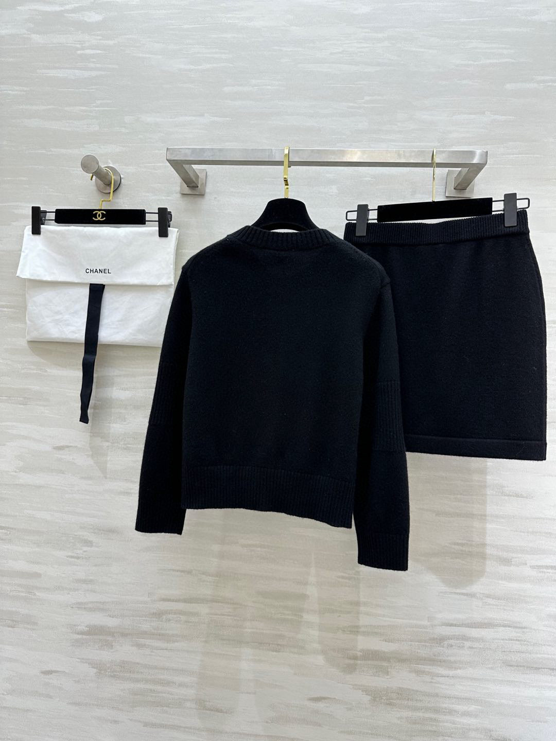C 25 Backpack buckle cashmere cardigan + skirt
