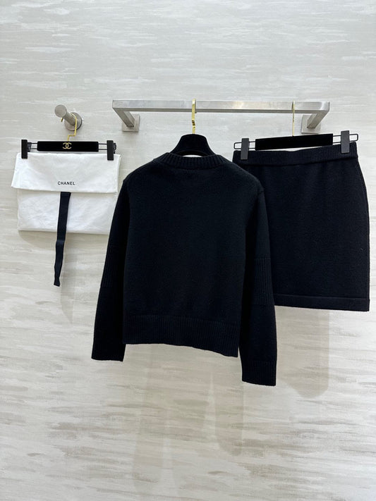 C 25 Backpack buckle cashmere cardigan + skirt