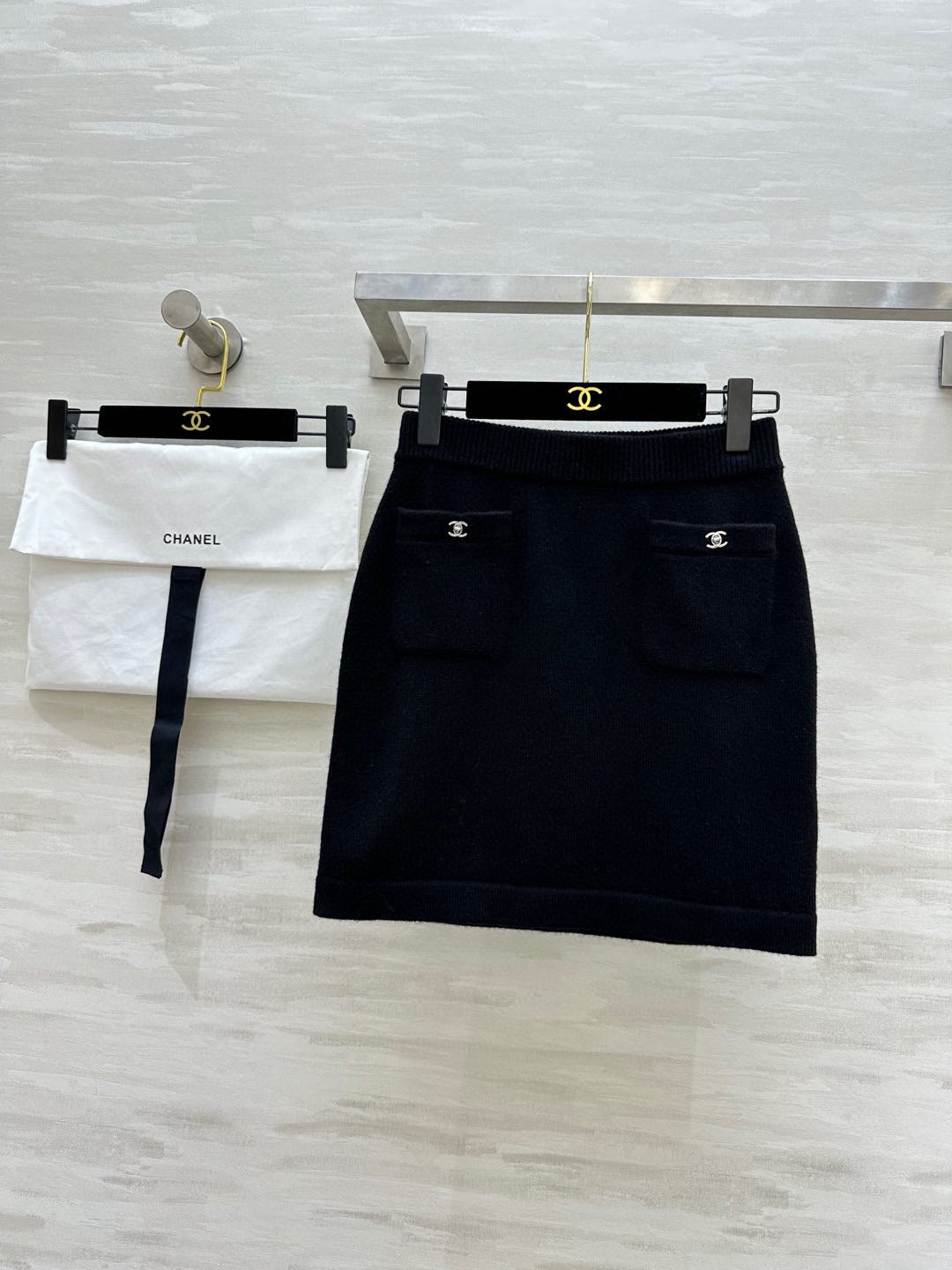 C 25 Backpack buckle cashmere cardigan + skirt