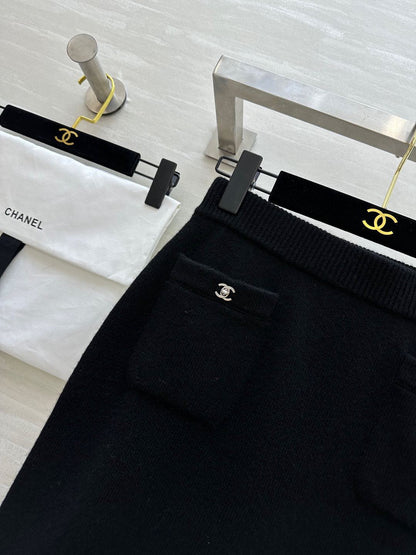 C 25 Backpack buckle cashmere cardigan + skirt