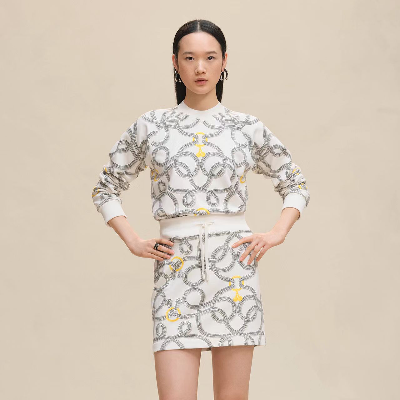 H 24 Rope knot pullover sweater half skirt suit