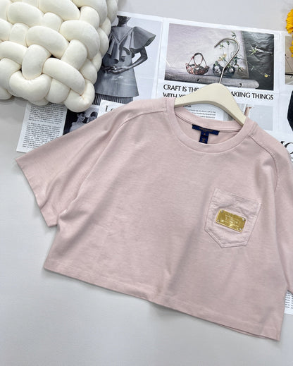 2025 nouveau T-shirt à manches courtes en métal à poche courte avec la même jupe midi 