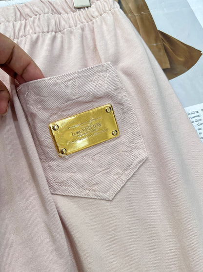 2025 nouveau T-shirt à manches courtes en métal à poche courte avec la même jupe midi 