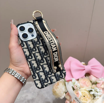Embroidered fabric wrist/card holder phone case
