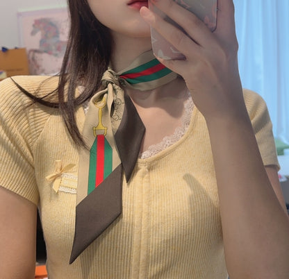 Classic belt with gold lock and letter scarf