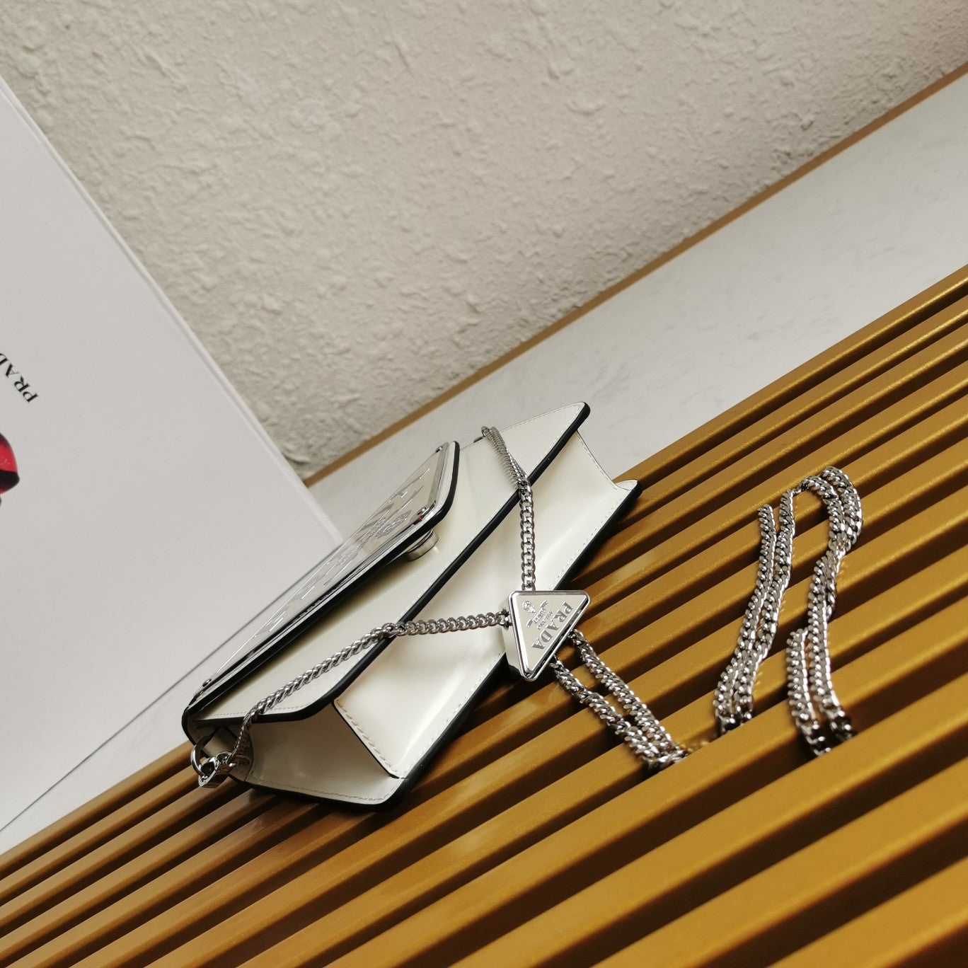 P Large Triangle Logo Chain Bag