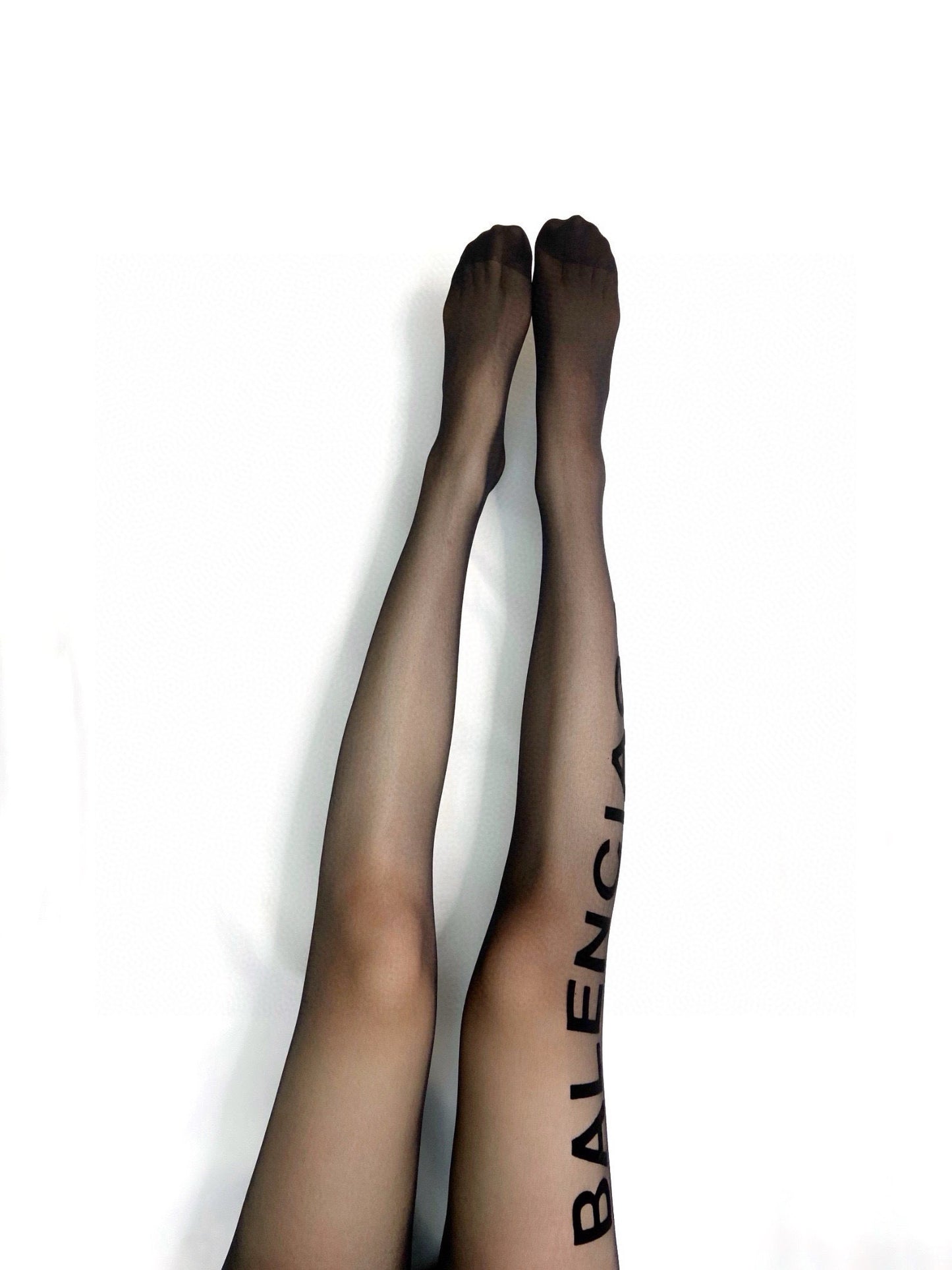 B Large logo on the side flocked lettering stockings