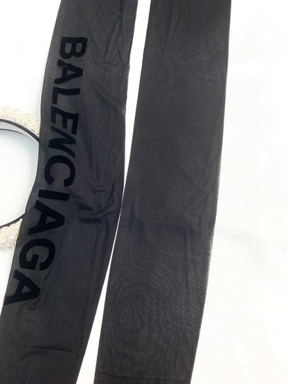 B Large logo on the side flocked lettering stockings