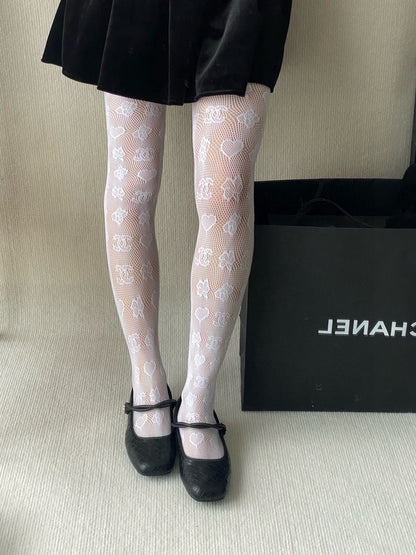 C Heart logo fishnet tights