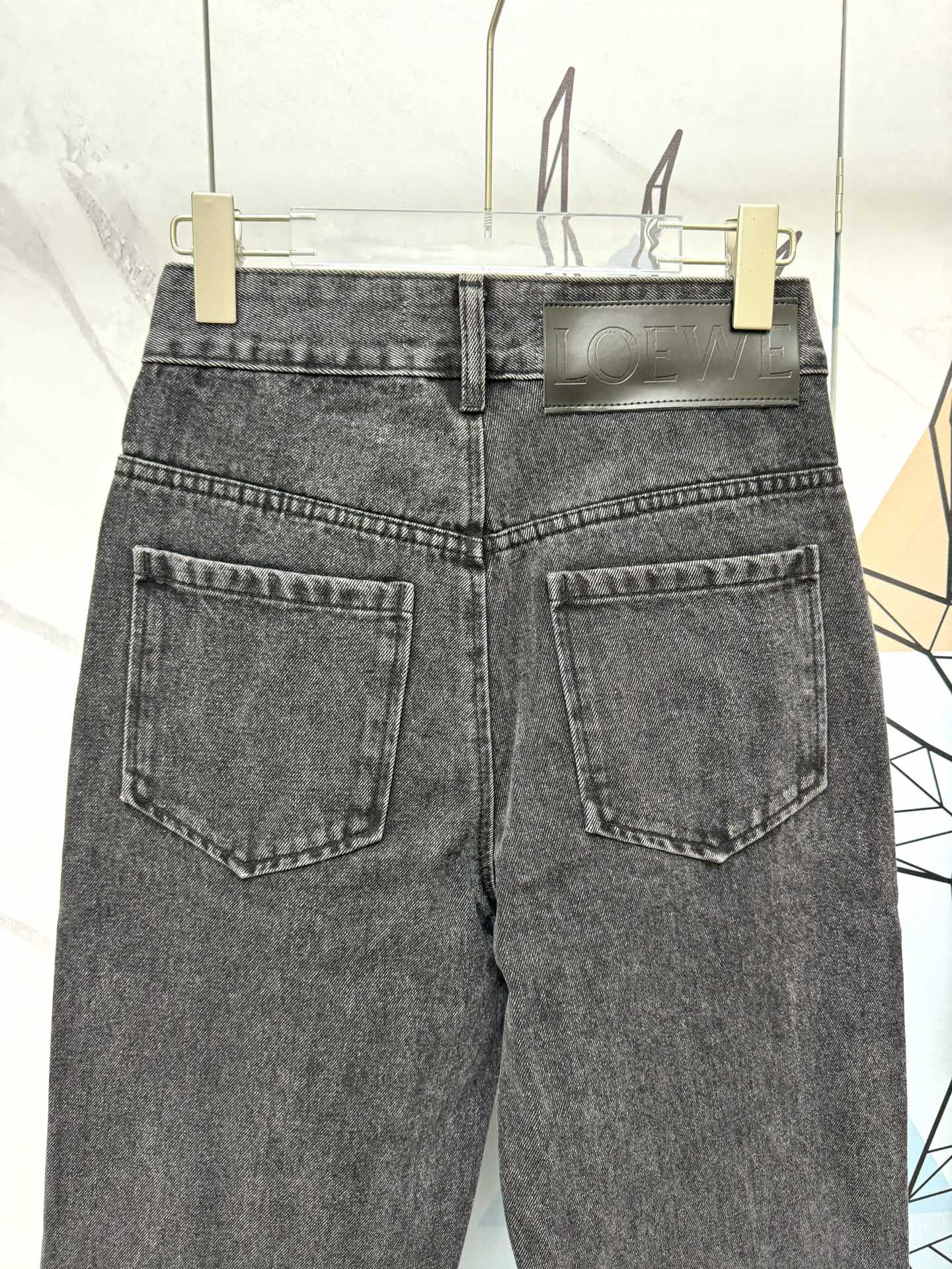 LO 25 Embroidered logo jeans at knee position