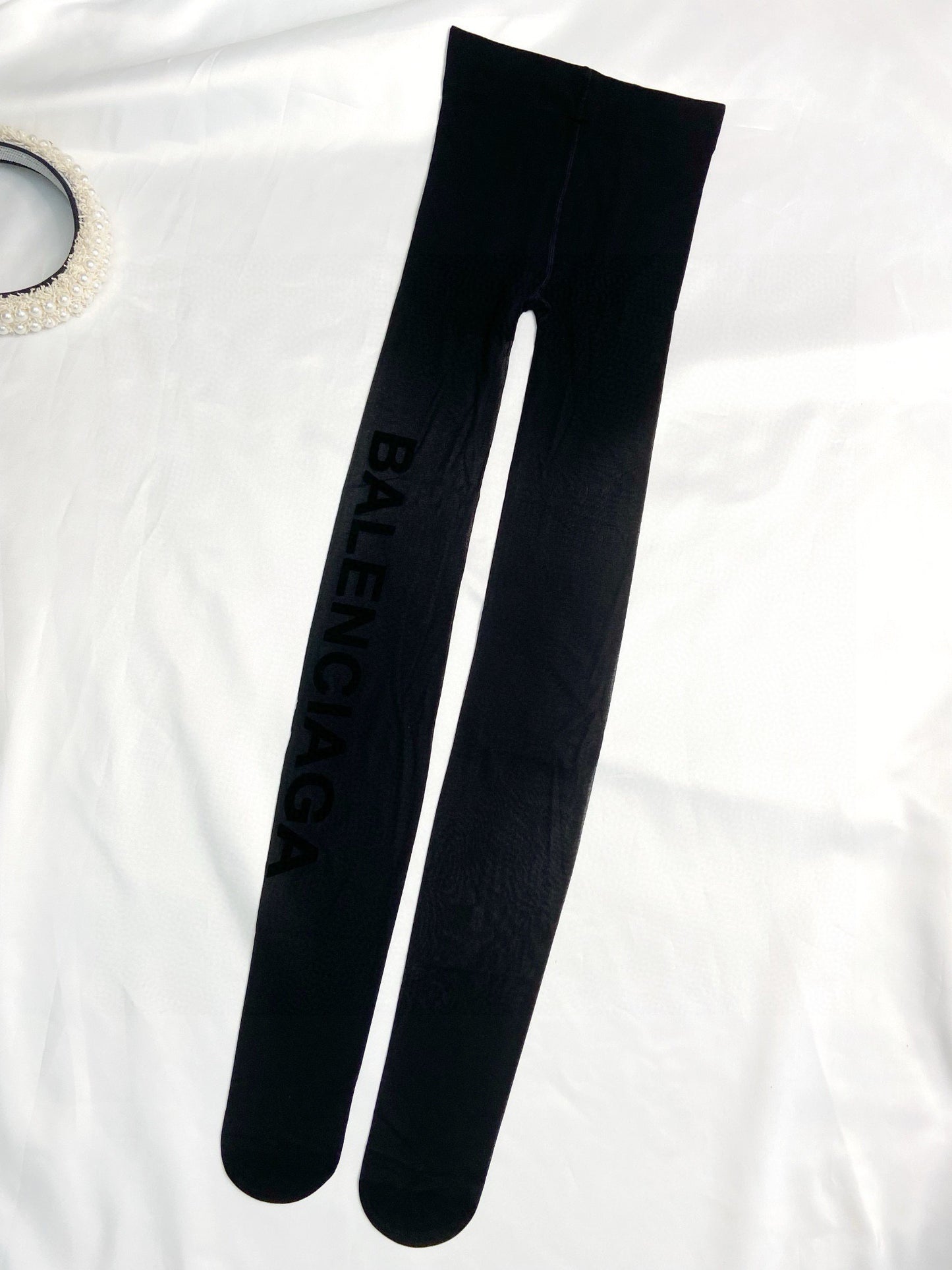 B Large logo on the side flocked lettering stockings
