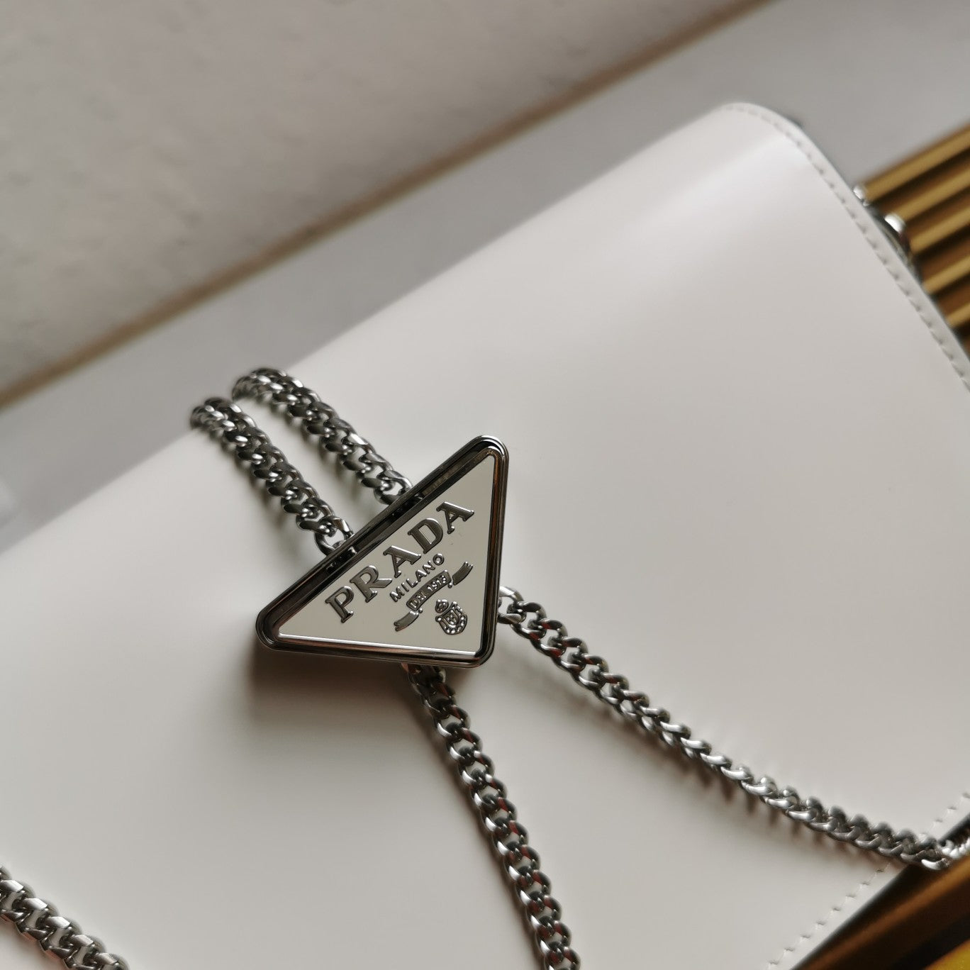 P Large Triangle Logo Chain Bag