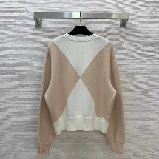 He 25 Two tone spliced short pullover sweater