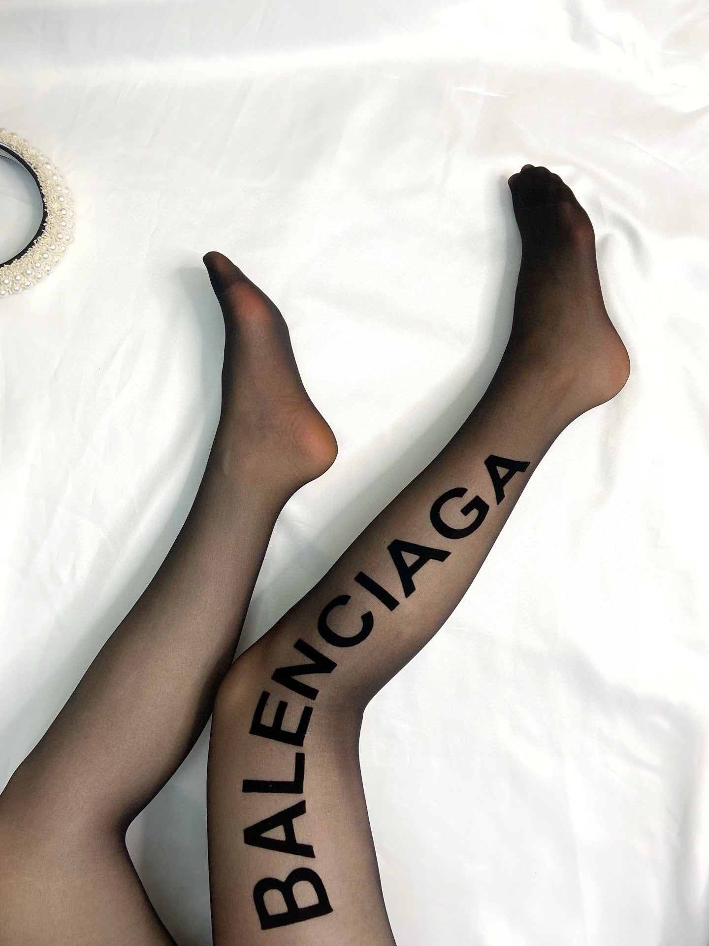 B Large logo on the side flocked lettering stockings