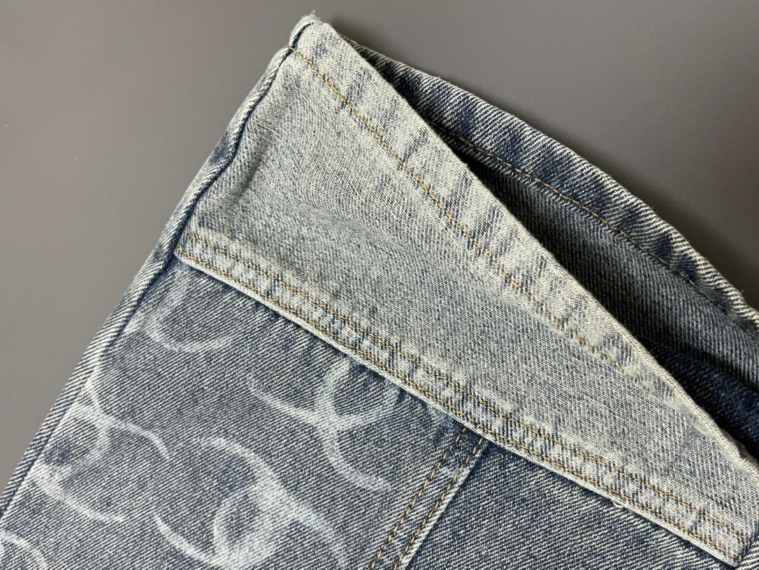 C 24 Light grey all-over print paneled denim trousers