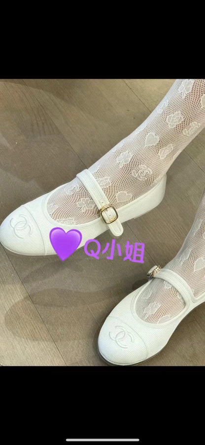 C Heart logo fishnet tights