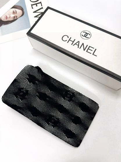 C Heart logo fishnet tights