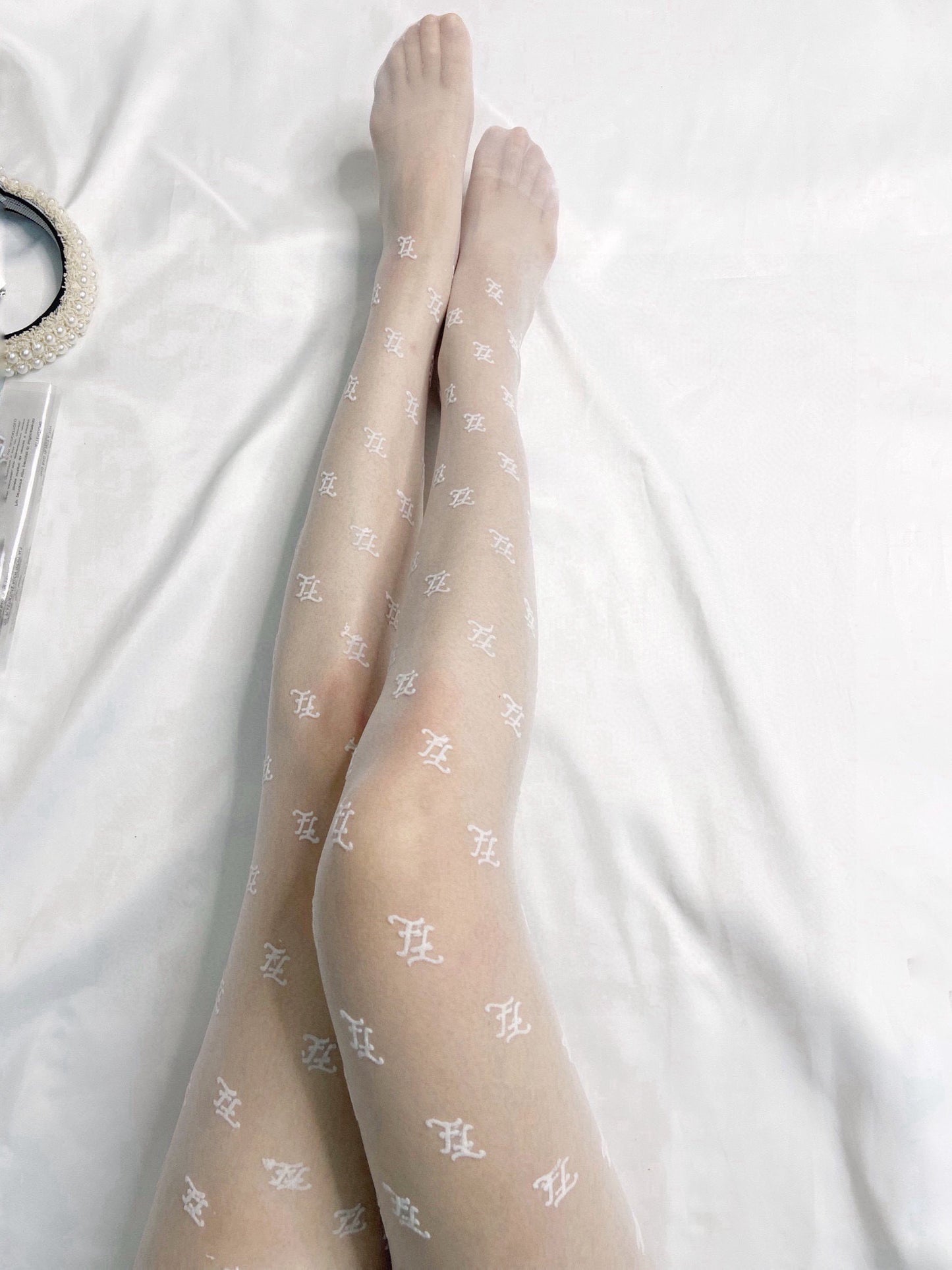 F Flocked wave letter stockings