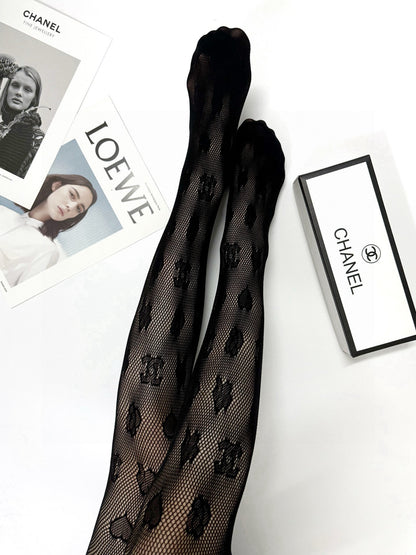 C Heart logo fishnet tights