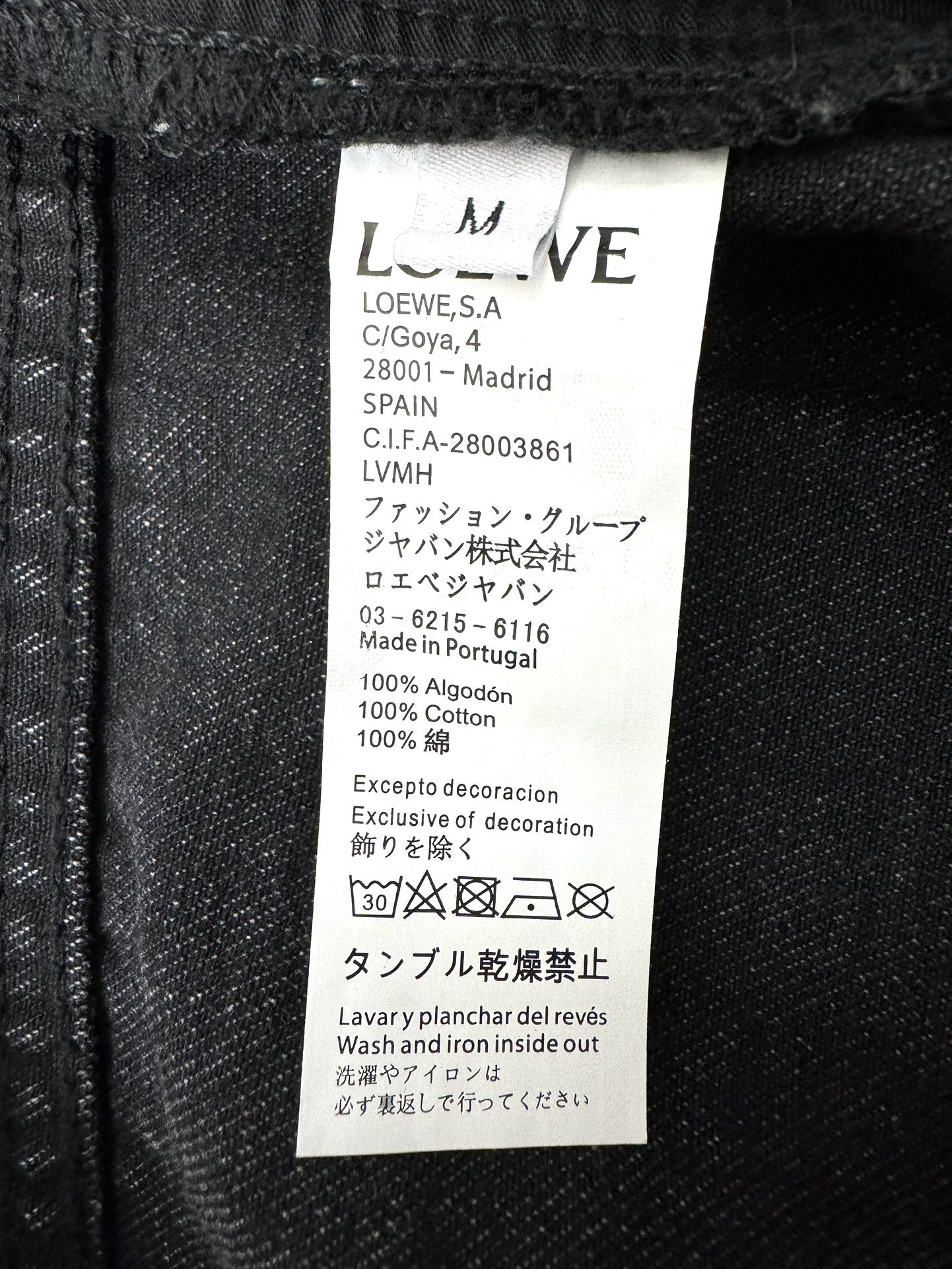 LO 25 Embroidered logo jeans at knee position