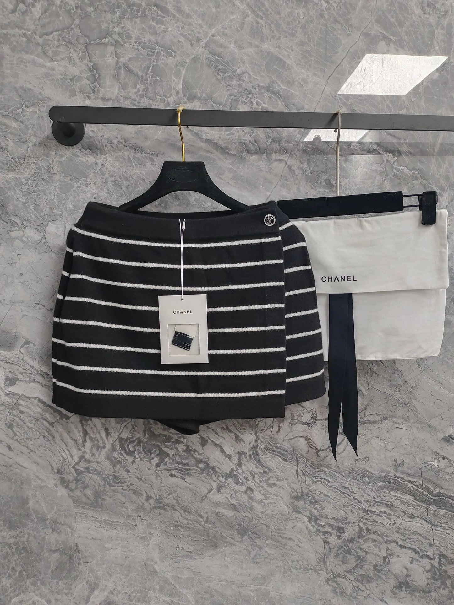 C 25 Light blue and black striped Swallow buttons short skirt