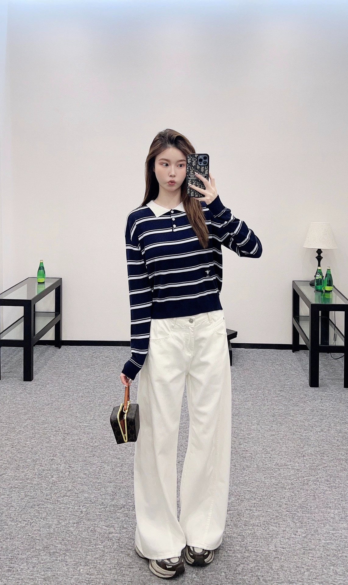 D 25 Lapel striped knit long-sleeved top.