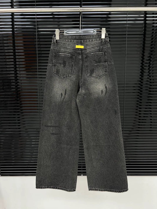 D 25 Ripped ink-splashed black and grey trousers Jeans
