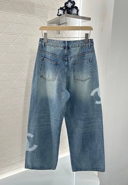 C 25 Lace-embroidered denim trousers