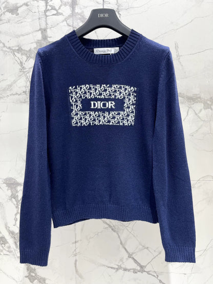 D 25 New letter-print cashmere and wool sweater.