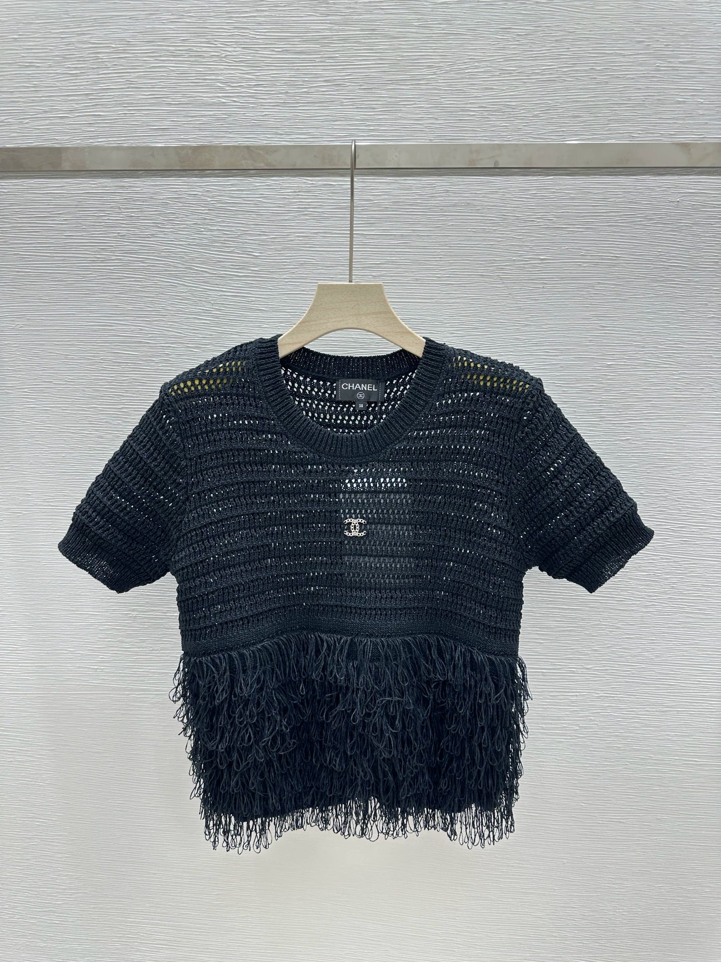 25 New Cutout Knit Splicing Tassel Metal Logo Vest