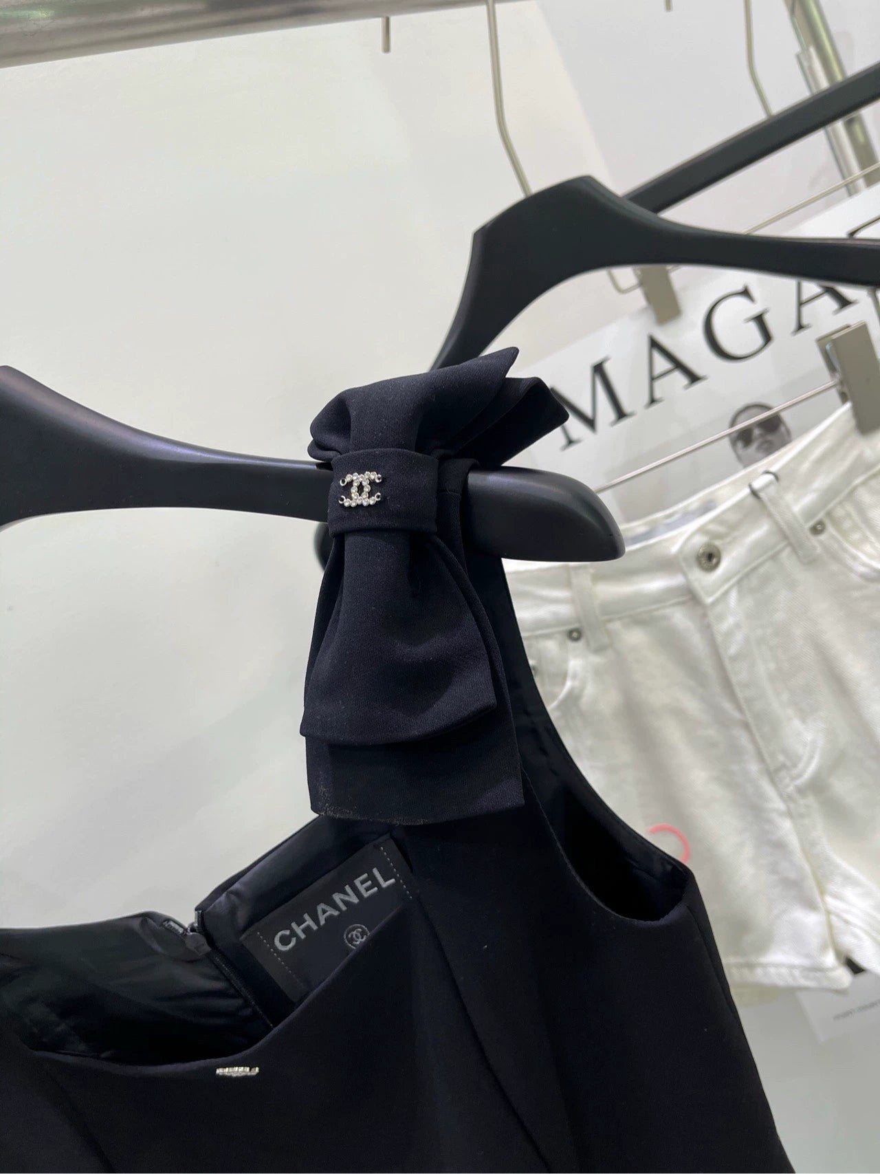 C 25 Shoulder bow black skirt