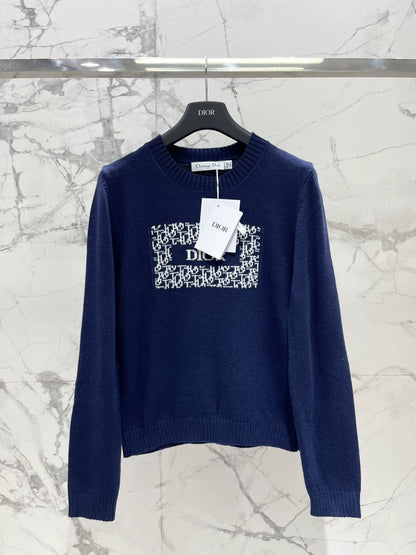 D 25 New letter-print cashmere and wool sweater.