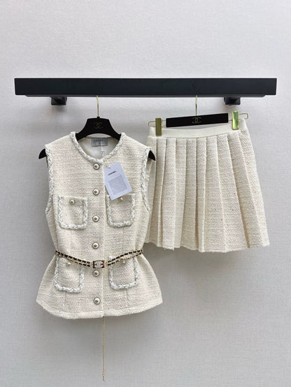 C 25 Frühling/Sommer Neues Strickset Ärmellose Strickweste + Druckplissierter Halbrock 
