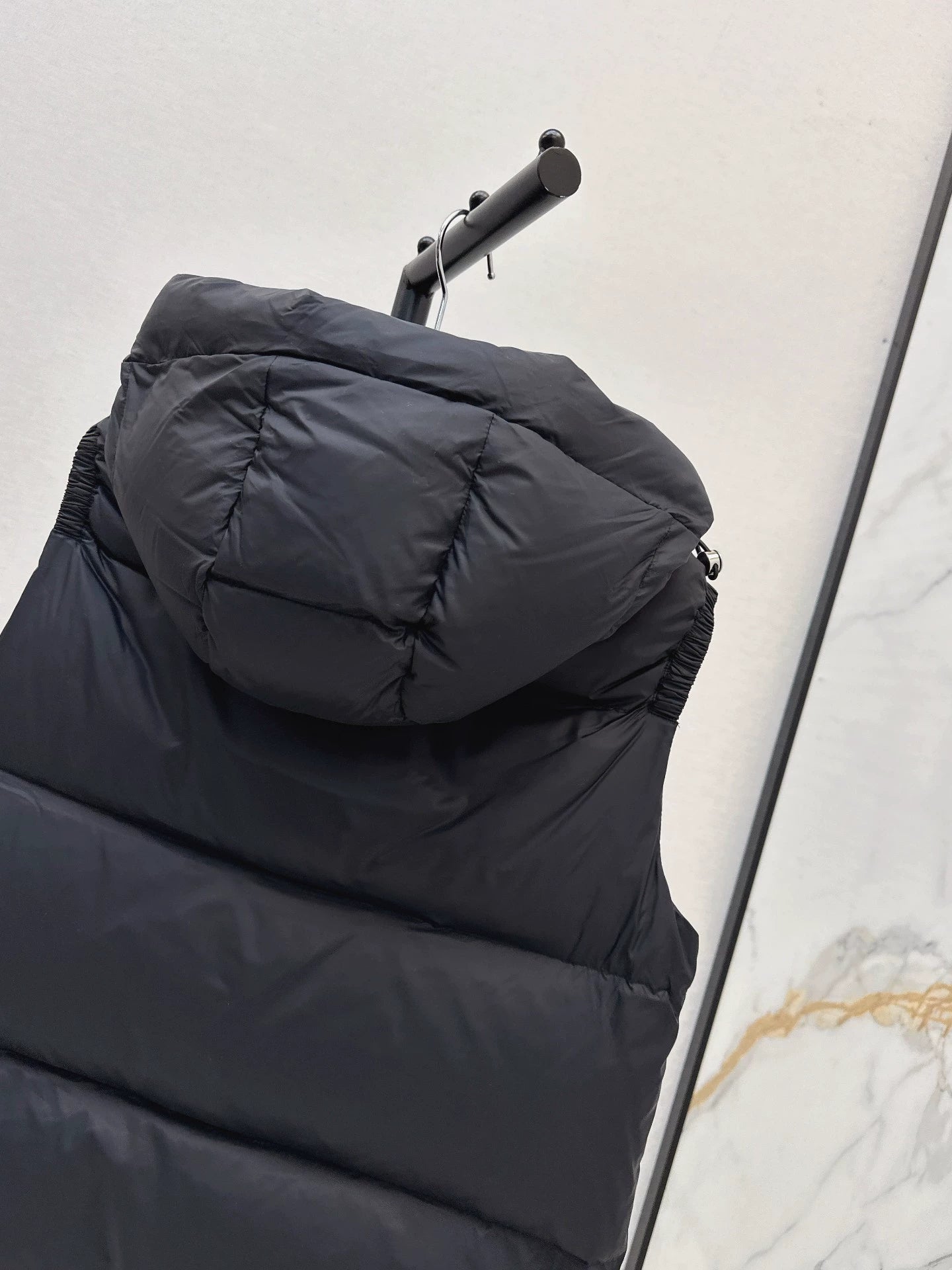 P 25fw hooded turtleneck down vest