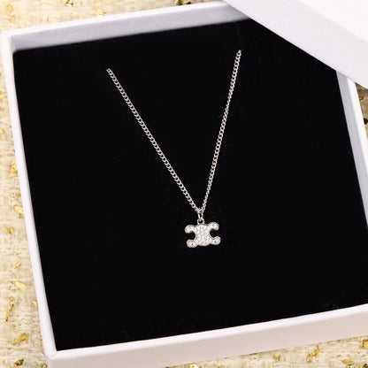 CE 25 Gold necklace with full diamond logo and Arc de Triomphe logo